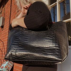big black faux leather bag